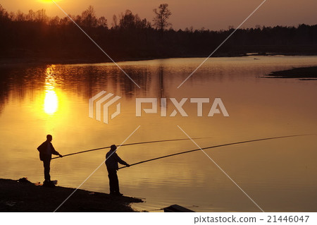 Two men fishing on river Two men fishing on river 21446047