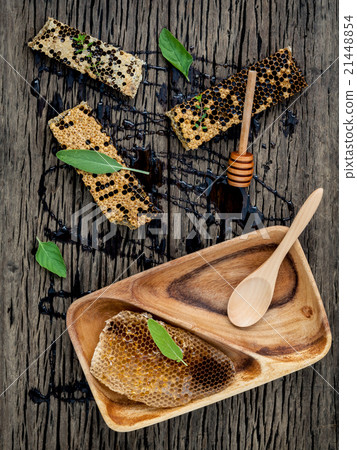 Honeycomb and honey  with peppermint. 21448854