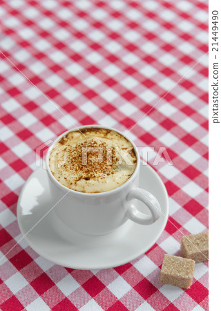 Black coffee in a white porcelain cup 21449490