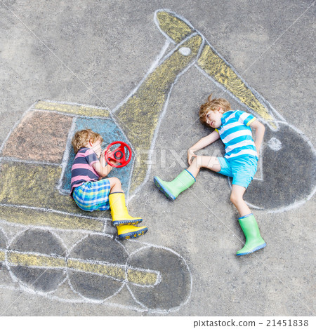Two little kid boys with excavator chalk picture 21451838