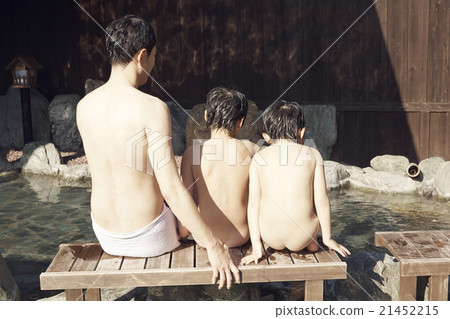 Parent and child entering outdoor bath Parent and child entering outdoor bath 21452215