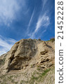 sandy rock on sky background 21452228