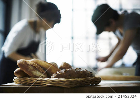 A couple making bread A couple making bread 21452324