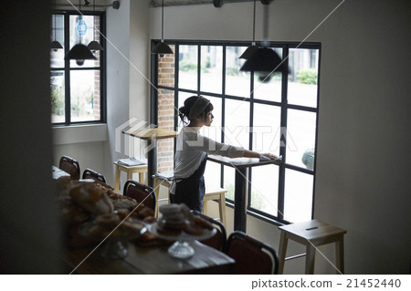 Woman cleaning 21452440