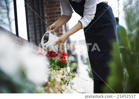 A woman preparing for opening 21452517