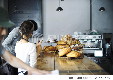 A woman preparing for opening A woman preparing for opening 21452679