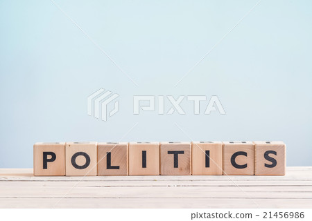 Politics sign made of wooden cubes 21456986