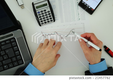 Businessman analyzing stock market 21457782