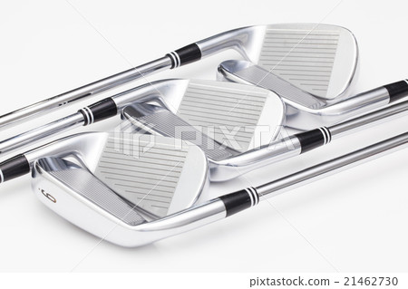 Titanium golf clubs on the white table 21462730