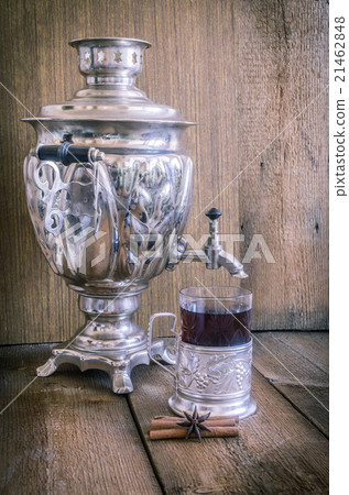 Tea in glass with coaster  and russian samovar  21462848