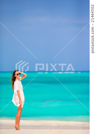 Young beautiful woman during tropical beach Young beautiful woman during tropical beach 21464502