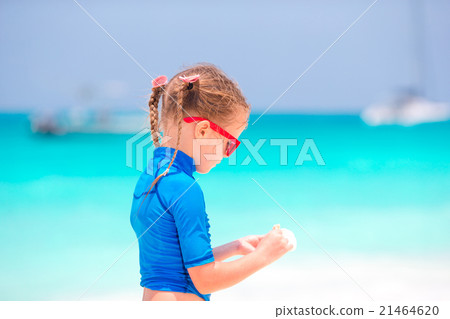 Adorable little girl at tropical beach during Adorable little girl at tropical beach during 21464620