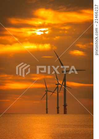 Sunset Offshore Wind Turbine in a Wind farm 21466217