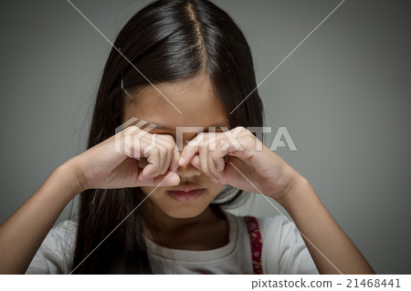 Lonely Asian child crying in the darkroom Lonely Asian child crying in the darkroom 21468441
