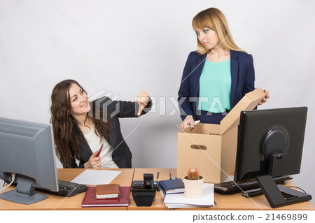 Office gesture girl humiliates the dismissed colleague Office gesture girl humiliates the dismissed colleague 21469899