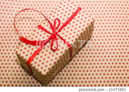 Gift package with red bow Gift package with red bow 21471661