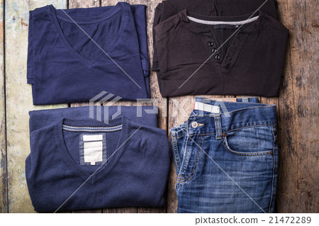 Various Man clothes collected on wooden background 21472289