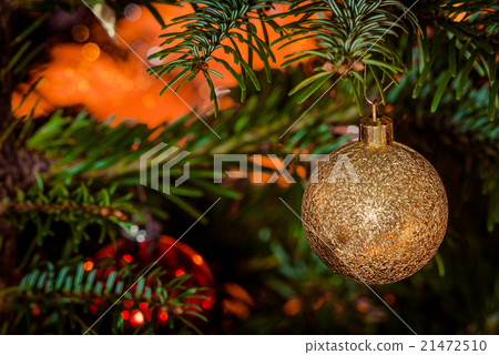 Glittering Xmas bauble in gold Glittering Xmas bauble in gold 21472510