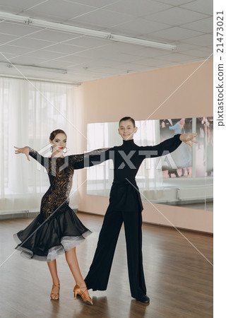Professional dancers dancing in ballroom. Latin. Professional dancers dancing in ballroom. Latin. 21473021