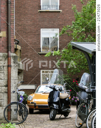 European street corner Classic car and motorcycle European street corner Classic car and motorcycle 21473026