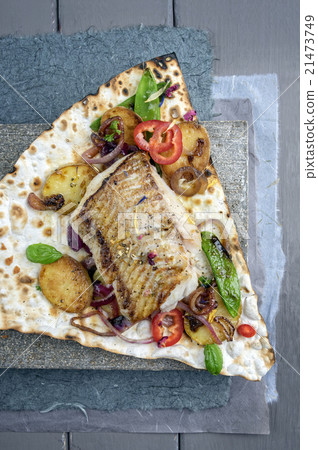 Codfish Filet with Vegetable on Yufka Bread 21473749