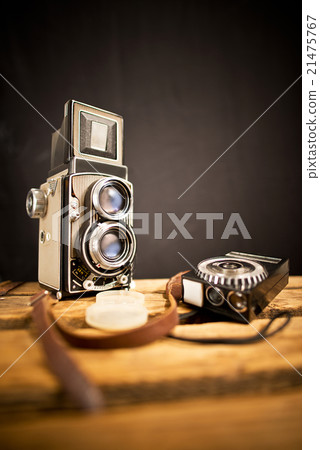 old twin-lens reflex camera with light meter 21475767