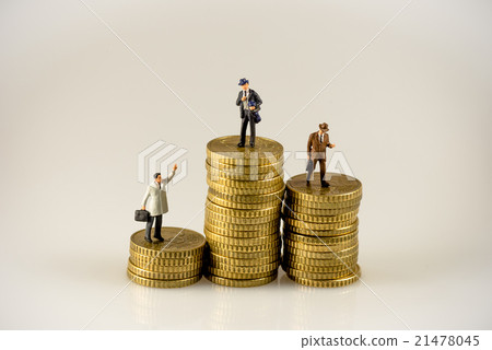 Businessman on the top of coins stack 21478045