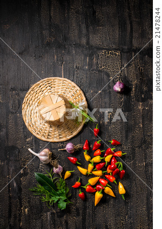 top down of rural still life peppers, garlics top down of rural still life peppers, garlics 21478244