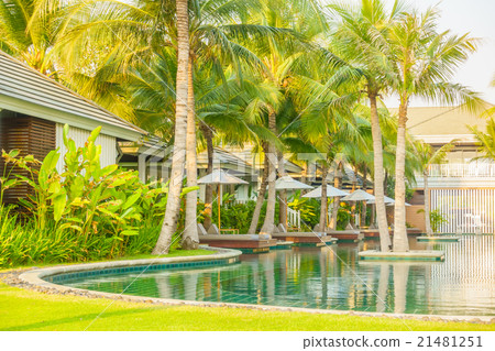 Umbrella and chair around swimming pool Umbrella and chair around swimming pool 21481251