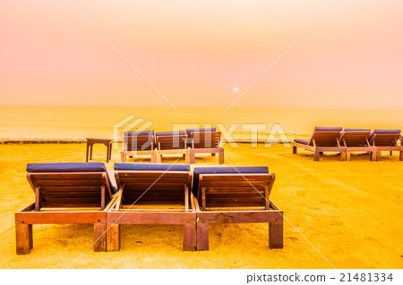 Empty chair on the beach 21481334