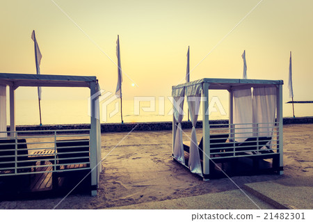 Empty chair on the beach 21482301