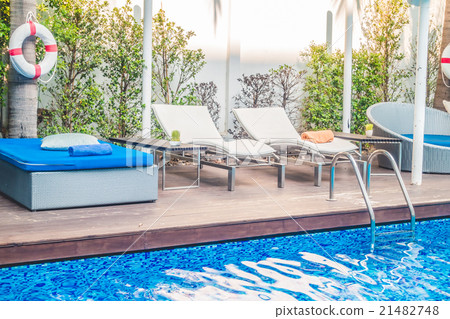 Umbrella pool and chair Umbrella pool and chair 21482748