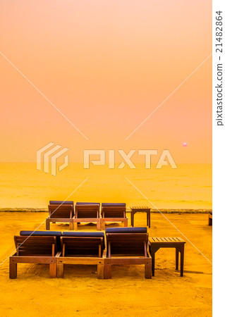 Empty chair on the beach Empty chair on the beach 21482864