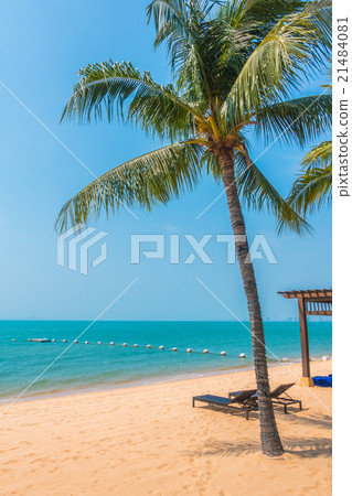 Beautiful beach and sea with palm tree Beautiful beach and sea with palm tree 21484081
