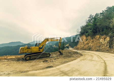 Excavators mountain road 21495029
