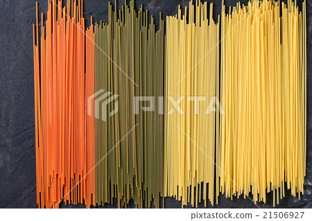 Dry colorful pasta spaghetti Dry colorful pasta spaghetti 21506927