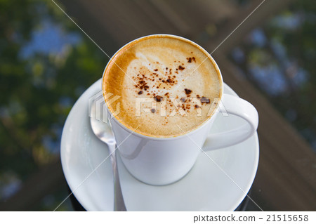 Cup of art latte on a cappuccino coffee Cup of art latte on a cappuccino coffee 21515658