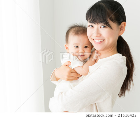 Baby and mother image 21516422