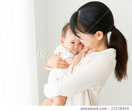Baby and mother image 21516424
