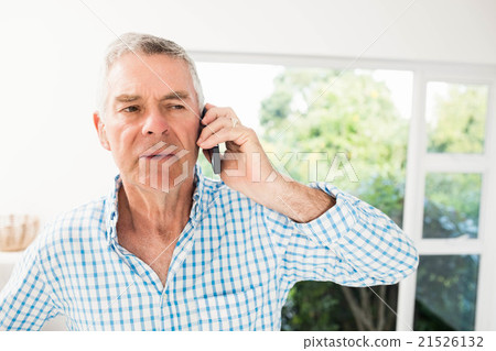 Senior man on a phone call Senior man on a phone call 21526132