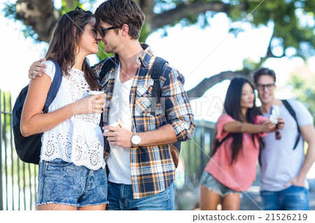 Hip couple about to kiss Hip couple about to kiss 21526219