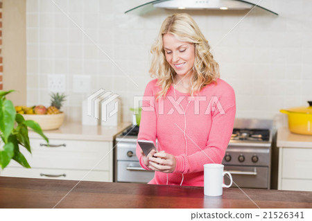 Beautiful woman listening to music 21526341