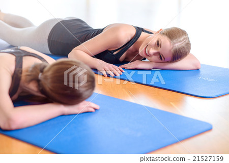 Pleasant girls doing exercises 21527159