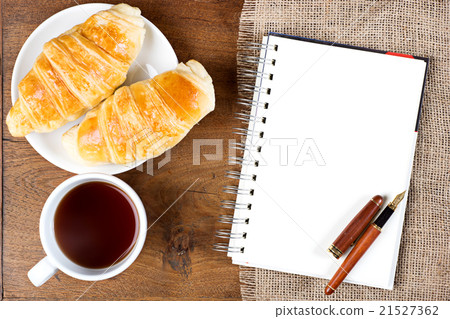 croissant cup coffee white book pen 21527362