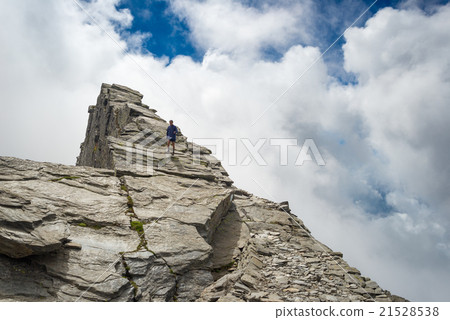 Free mountain climbing on steep rocky slope Free mountain climbing on steep rocky slope 21528538