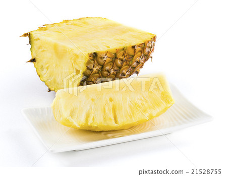 Sliced pineapple on white plate Sliced pineapple on white plate 21528755