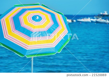 Colorful umbrella on the tropical beach Colorful umbrella on the tropical beach 21528869