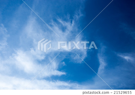 white fluffy clouds in the blue sky 21529655
