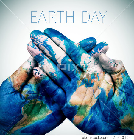 text earth day and hands patterned with world map 21530104