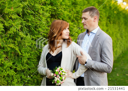 Man tenderly embraced Pregnant Woman 21531441